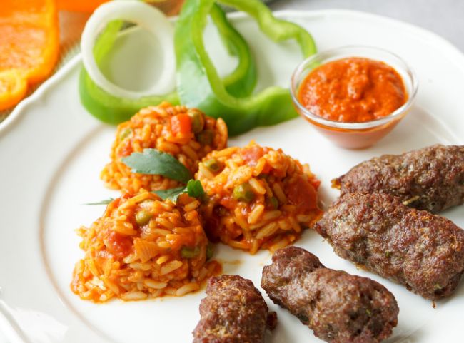 Djuvec Reis mit Cevapcici Djuvec Reis mit Cevapcici